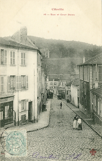 Entrée de la rue du Doisu, en contrebas du croisement avec la Route nationale. On distingue à gauche l’étage de séchage d’une laverie. (coll. part.) Entrée de la rue du Doisu, en contrebas du croisement avec la Route nationale. On distingue à gauche l’étage de séchage d’une laverie. (coll. part.)